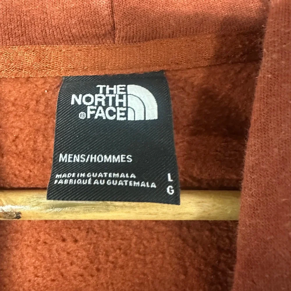 The North Face Mens Burnt Orange Logo Pullover Hoodie Size Large Distressed Hole
